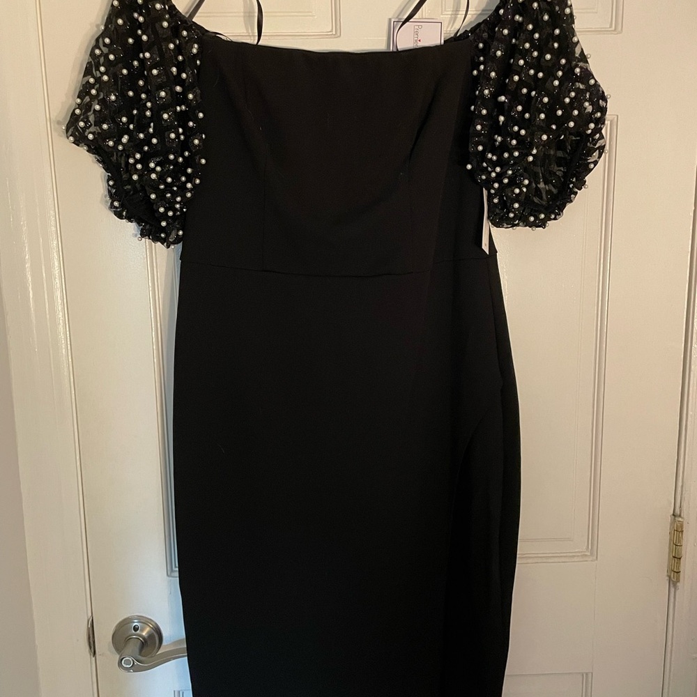 Elegant Black Dress with Pearl Embellishments